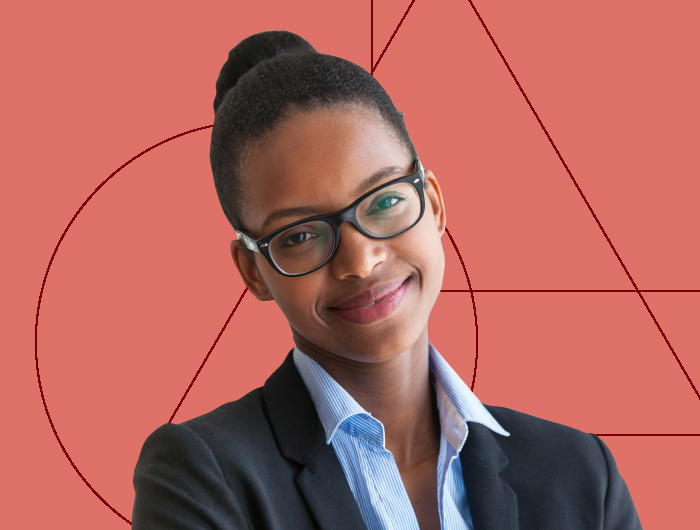 Placeholder of a smiling woman looking directly ahead wearing glasses